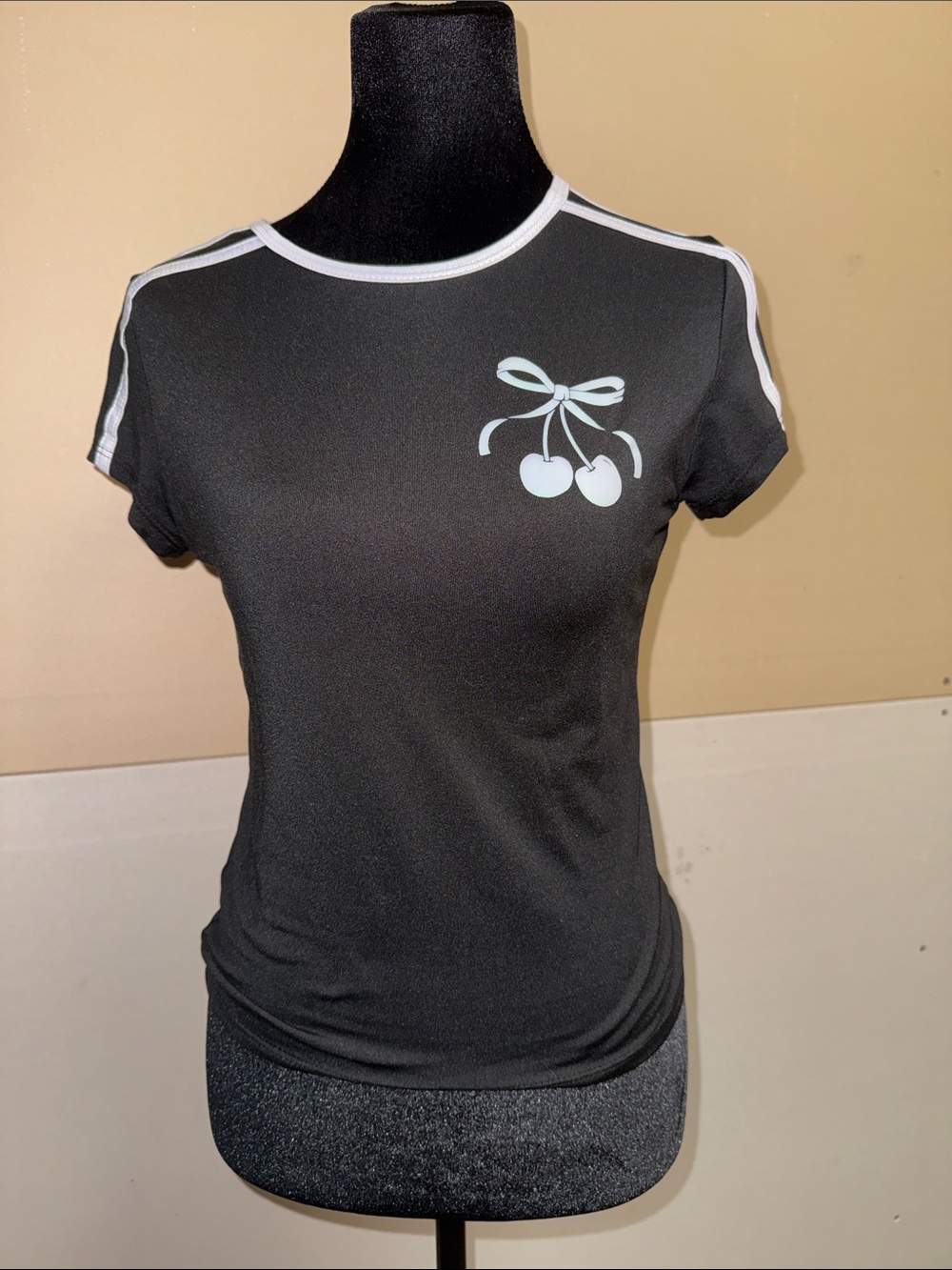 Evolution and Creation Black Short-Sleeve Tee with White Cherry Graphic
